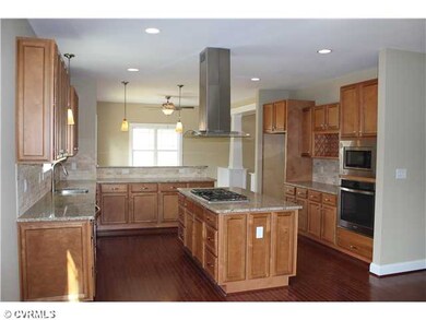 Kitchen - Large Kitchen with Stainless Steel Chimn