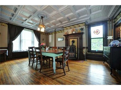 Dining Room. Tin ceiling, hardwood floors, origina