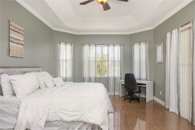 The bay windows provide natural light and beauty t