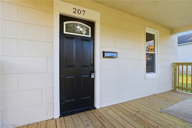 Property entrance with a deck
