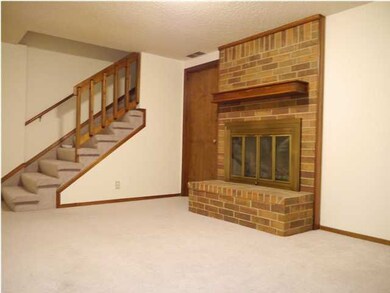 Daylight Basement Family Room with Woodburning Fir
