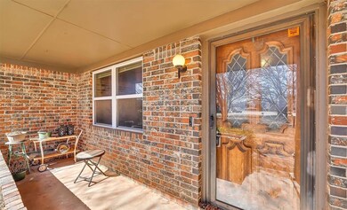 Property entrance with covered porch