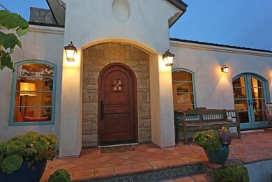 Custom Wood Door and Stone Entry