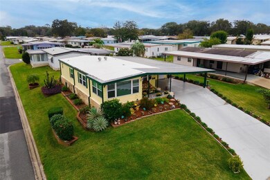 Aerial view of property located on corner lot.