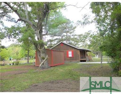 Exterior Front. With finished storage building