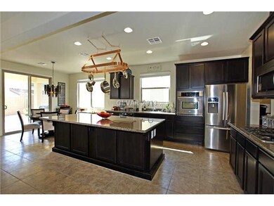 Property Photo. Tile flooring, upgraded cabinetry,