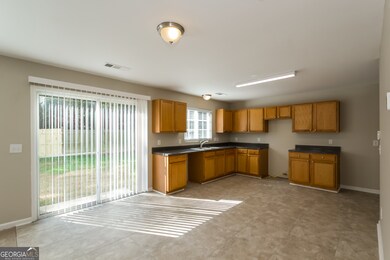 5677 Sable Way, Atlanta, GA 30349 - photo 6