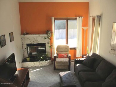 living room with vaulted ceilings