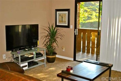 Living room with direct access to balcony.