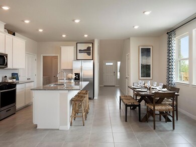 Kitchen featuring stainless steel appliances, a s