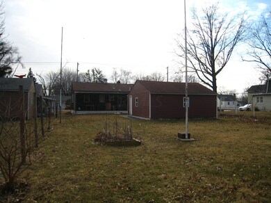 Rear View of the Home and Detached Garag
