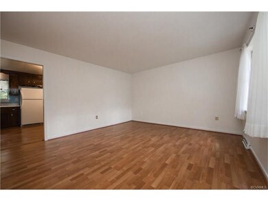 View of living room and entrance to kitchen