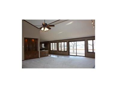 View from entryway of great room and lake view.