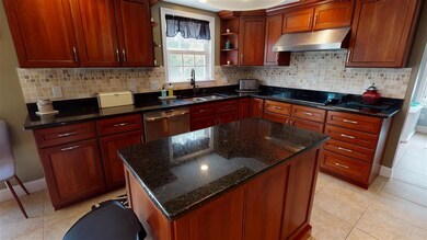 Cherry shaker cabinets, granite countertops & kitc