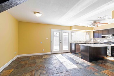 Upgraded Kitchen w/ Exit Doors