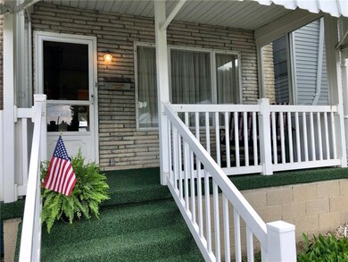 Charming covered front porch.