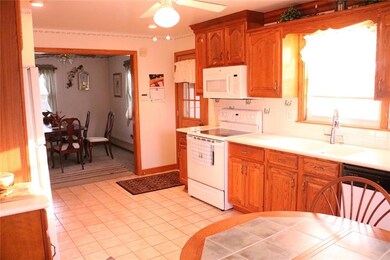 Newer  17x10 kitchen with oak cabinetry & ceramic 