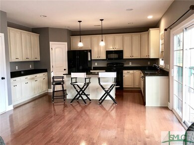 Ease of garage entrance to this desired open kitchen makes your lifestyle a breeze!