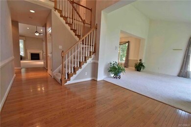 Beautiful open staircase leads to second floor lof