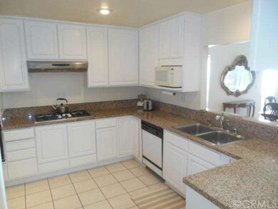 Tile flooring in kitchen.