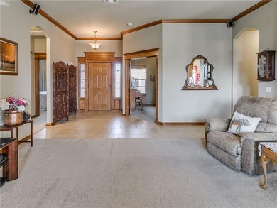 Spacious Entry leads into Living Room