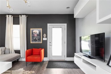 Gleaming engineered hardwood floors throughout the home