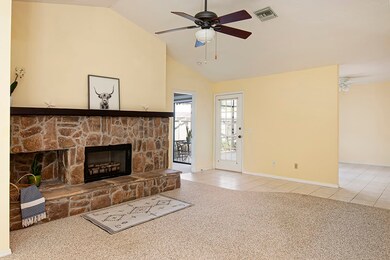 Living room w/ wood fireplace