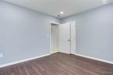 Spare room with recessed lighting, baseboards, and