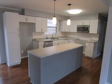 KITCHEN ISLAND AND PANTRY