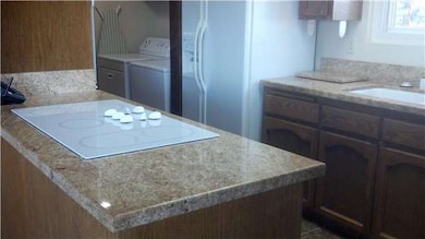 Newer electric stove, refrigerator and washer drye