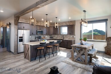 Kitchen and Dining Room(Pictured furnished. Furnis