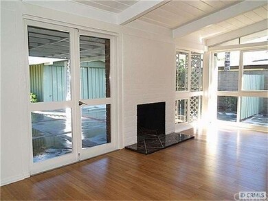 another view of living room with French doors to c