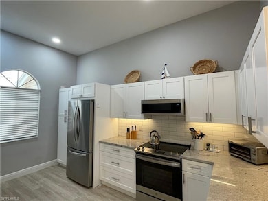 2671 Citrus Lake Dr unit 303, Naples, FL 34109 - photo 3