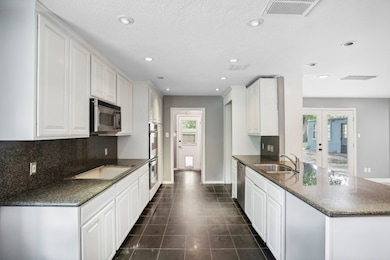 4202 Black Locust Dr, Houston, TX 77088 - photo 7