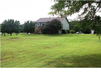 beautiful one acre corner lot