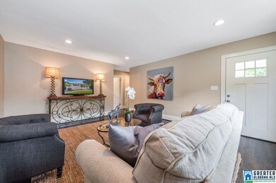 Another view of the family room and front entry.