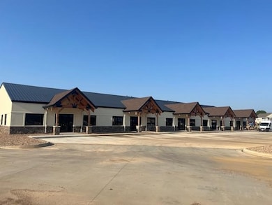 Grand Slam Business Park is a premier mixed-use development in Fort Smith. 17.72 acres, the property offers three 1.1-acre lots, 12 flexible buildings, fiber-optic connectivity, LED signage, and new road access with 20,000+ daily vehicle exposure. Projected returns include $1.836M annual rental income, $1M+ lot sales, and a 15.3% ROI. With proximity to Fort Smith Regional Airport and regional growth fueled by military expansion, this is a rare investment opportunity.