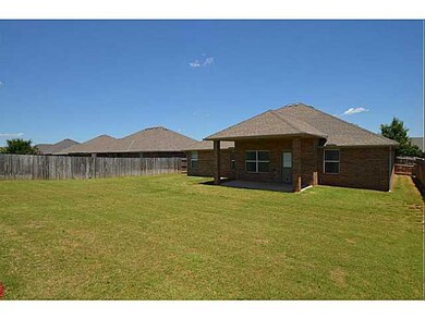 Exterior Back. Large spacious lot completely fence