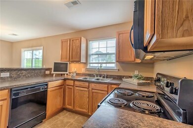 Another view of the kitchen looking towards the di