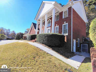 5121 Huntshire Ln SW, Lilburn, GA 30047 - photo 3