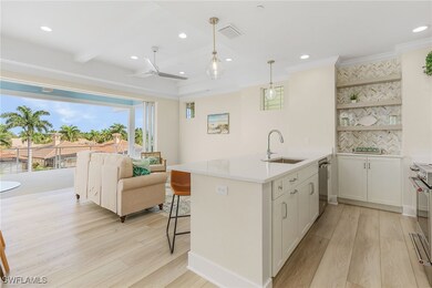 Kitchen with ceiling fan, stainless steel applianc