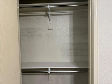 Closet featuring elevator