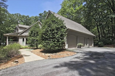 Large 3 car garage lends room for a golf cart or extra storage