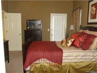 Master suite has a door that opens to covered pati