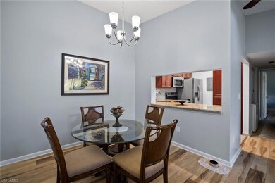 Dining space with light hardwood / wood-style floo