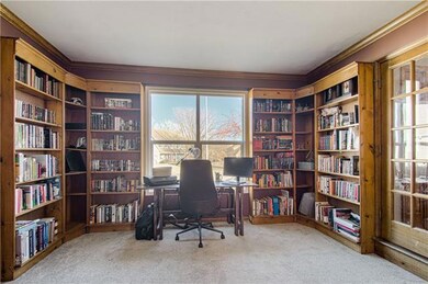 view to front yard from den/library