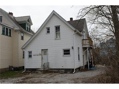 Back entry to lower unit, and side entrance to upp