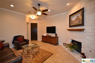 Tile floors in large living area, ceiling fans, cr