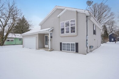 717 Amity St SE, Lowell, MI 49331 - photo 2