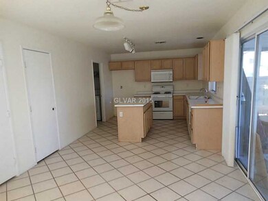 Property Photo. KITCHEN IS OPEN TO FAMILY ROOM AND